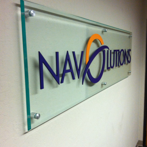 Lobby signage on glass installed in Pleasanton for Navolutions
