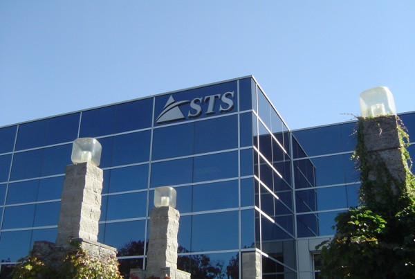 T. Bennett Services in Pleasanton made Stainless Steel Building Sign for STS
