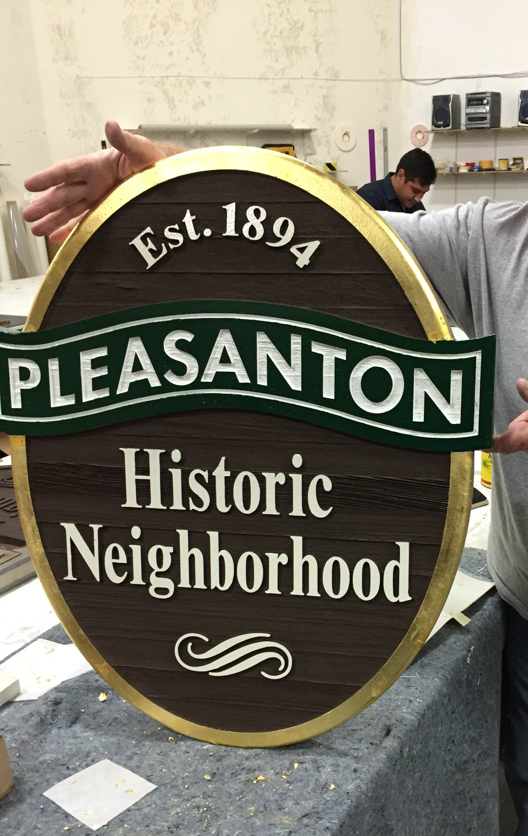 Sandblasted wood goldleaf sign for Pleasanton, CA
